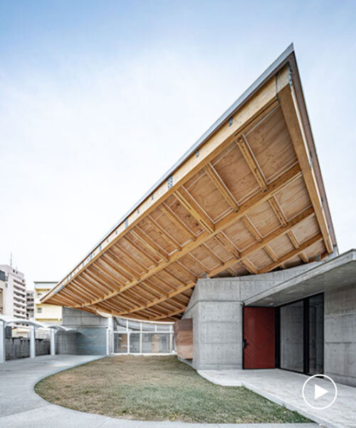hyperbolic roof composed of curved timber slats tops concrete residence in taiwan